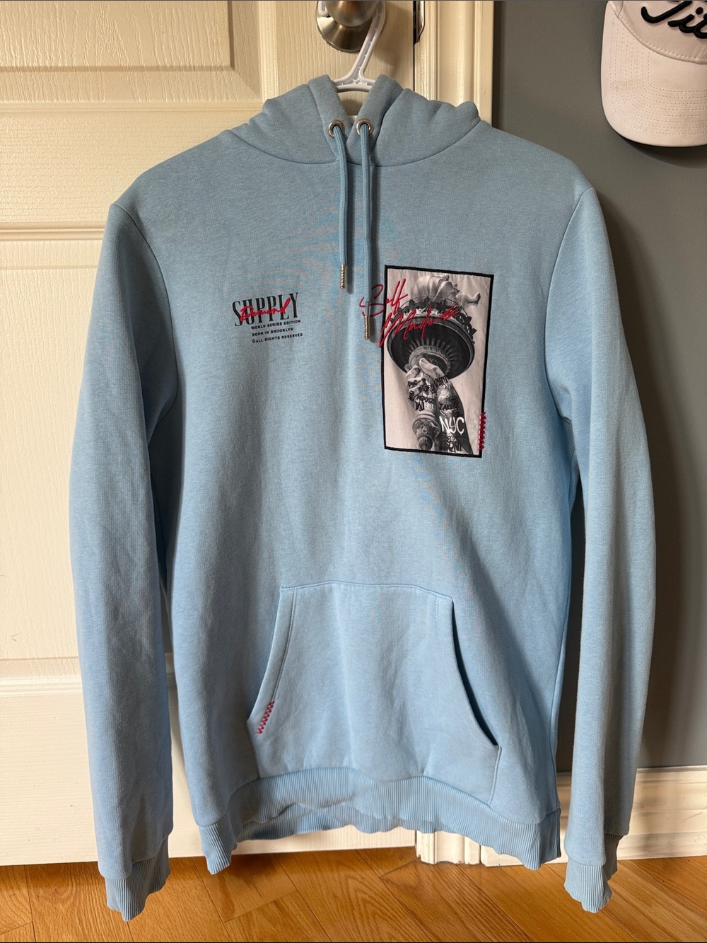 Light Blue Graphic Hoodie Sweatshirt - By Supply and Demand